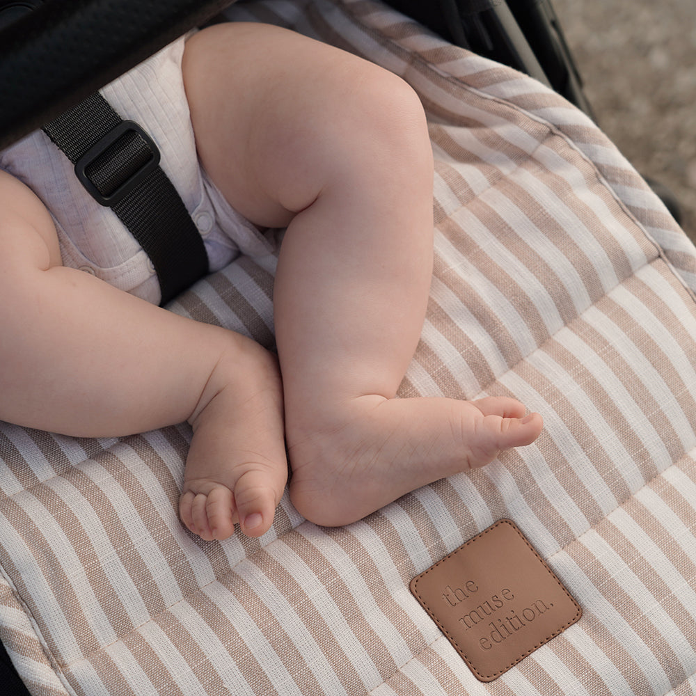 Close up baby's feet in buggy